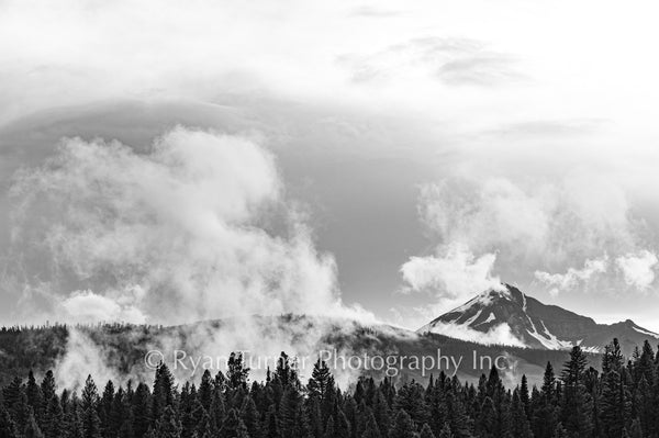 The Fog Lifting Off the Peak