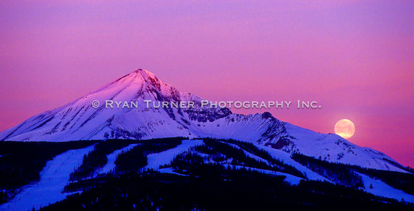 Moon Sets as the Sun Rises on Lone Peak