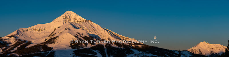 A Full Moon Between Lone and Fan Peaks